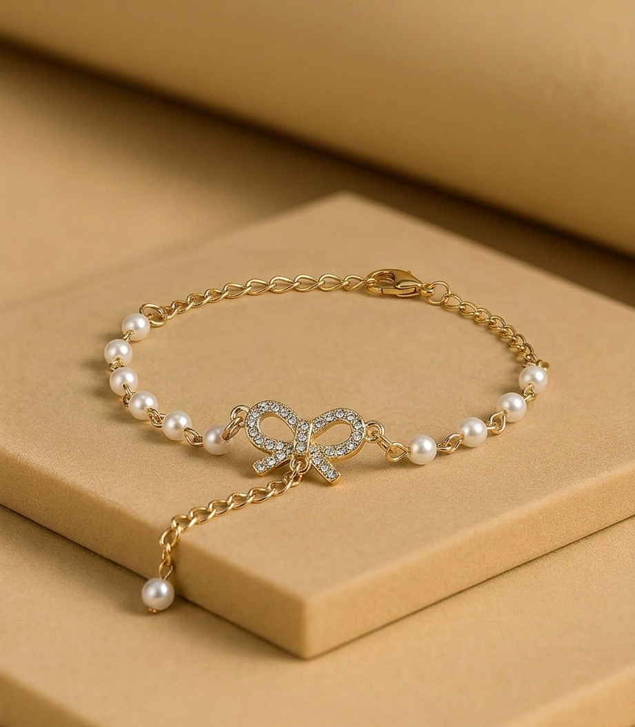 Gold Bow Pearl Bracelet – Elegant Crystal Knot Design | Adjustable Chain Jewelry for Women