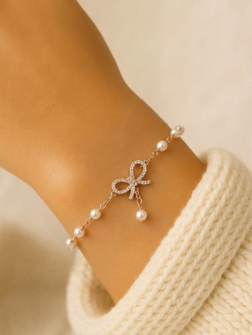Gold Bow Pearl Bracelet – Elegant Crystal Knot Design | Adjustable Chain Jewelry for Women